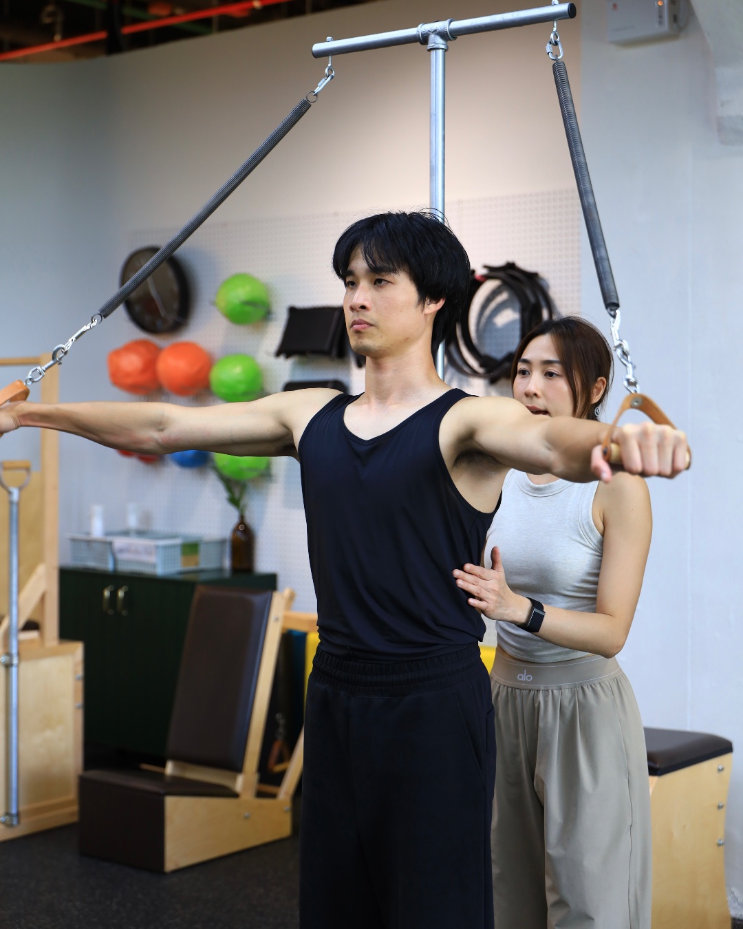 Teacher observing client posture